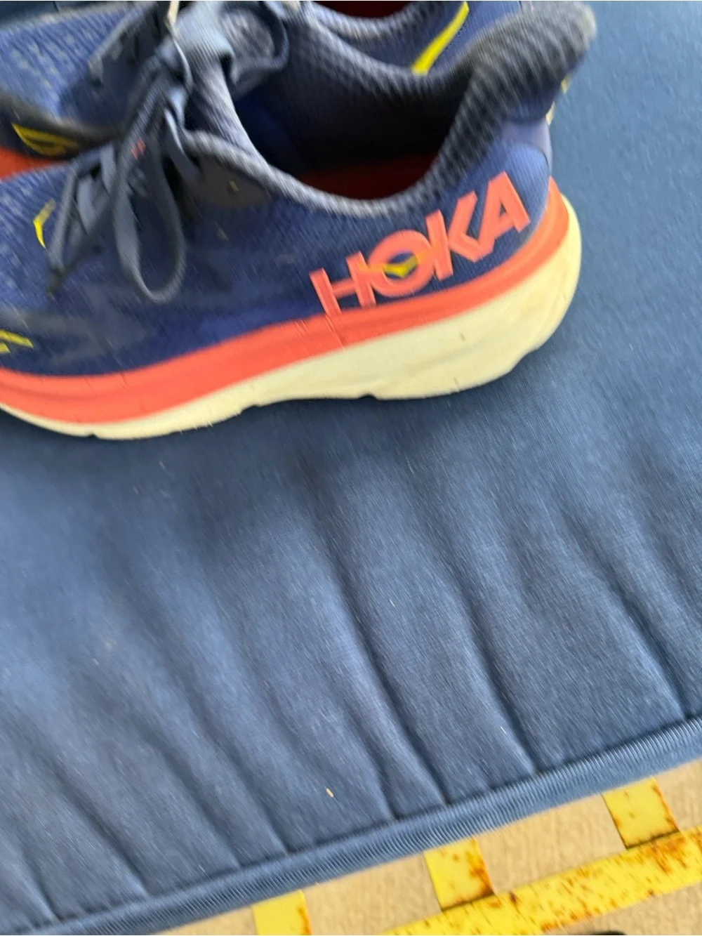 Hoka Women's Blue Running Shoes with Coral and Yellow Accents